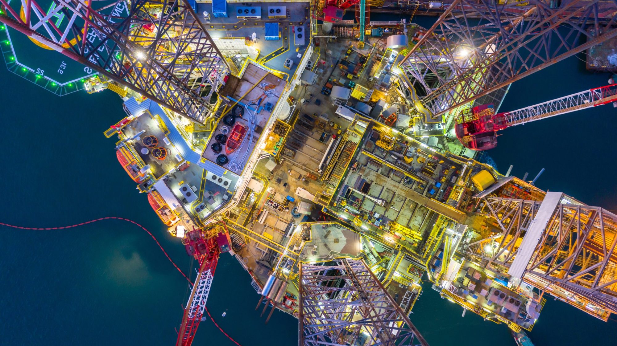 Aerial,View,Offshore,Jack,Up,Rig,At,Night,,Offshore,Oil